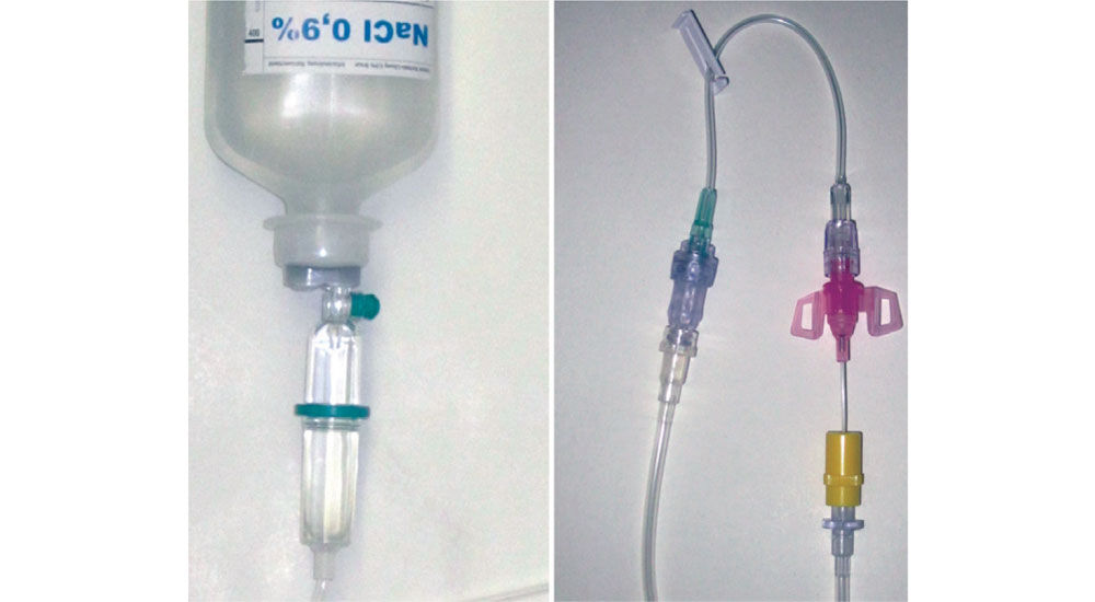 Figure 2. Close-up of assembled connections of Intrafix SafeSet® to Ecoflac® IV container and Intrafix SafeSet® to Caresite® extension line and Introcan Safety® 3 IV cannula (outside the sterile clean bench or aerosol chamber for demonstration purposes).